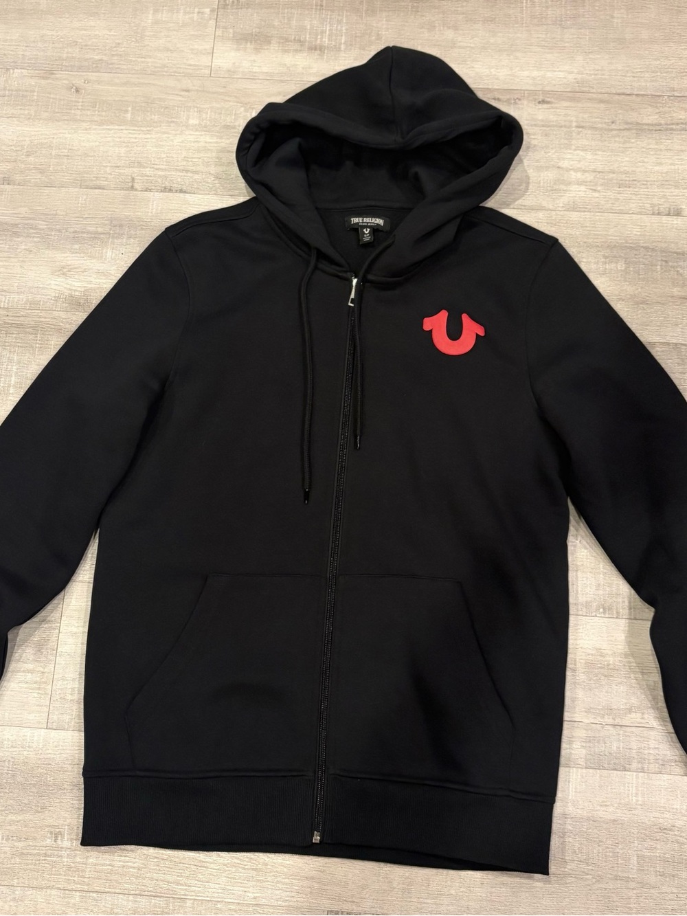 True Religion Black Hoodie with Red Horseshoe Emblem